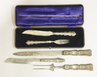 Lot 456 - Two pairs of carving sets and a bread knife