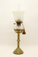 Lot 364 - A Victorian brass oil lamp with glass reservoir and shade