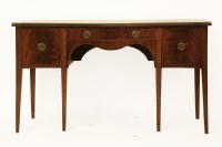 Lot 455 - A Georgian style mahogany serpentine sideboard. 148cm wide