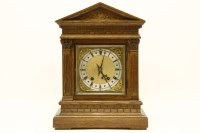 Lot 386 - A German (?) oak mantel clock