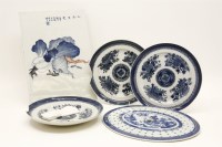 Lot 280 - A blue and white tile decorated with vegetables