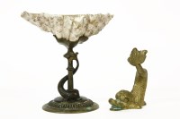 Lot 176 - A sea shell mounted on a bronze base cast with a dolphin