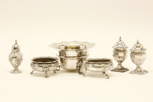 Lot 46 - A pair of small silver salts on short feet