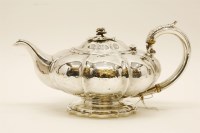 Lot 93 - A George IV silver teapot marks for London with ivory insulators