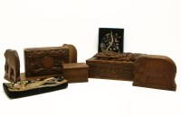 Lot 268 - A collection of carved wooden Chinese and Indian carved cigarette boxes