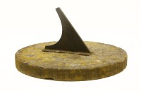 Lot 204 - A mid 19th century carved stone sun dial