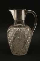 Lot 90 - A hobnail and spiral cut silver mounted claret jug