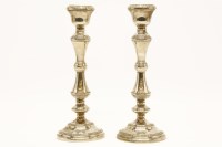 Lot 109 - A pair of silver candlesticks