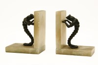 Lot 175 - A pair of alabaster bookends