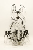 Lot 214 - French cut glass wrought iron chandelier