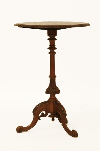 Lot 458 - A Victorian walnut tripod table
