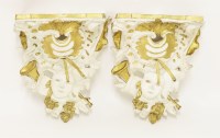 Lot 517 - A pair of plaster wall brackets