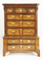 Lot 562 - A Continental walnut inlaid chest on stand