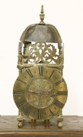 Lot 435 - A brass lantern clock