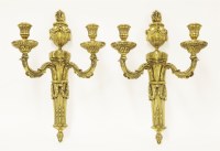 Lot 528 - A pair of gilt bronze twin-branch wall lights