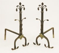 Lot 599 - A pair of cast iron andirons