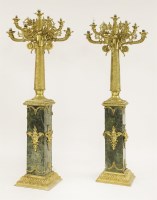 Lot 605 - A pair of impressive gilt bronze eight-branch candelabra