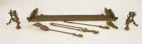 Lot 612 - A brass fender set