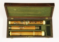 Lot 191 - A boxwood and ivory flute