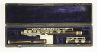 Lot 192 - A rosewood and nickel-mounted flute