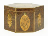 Lot 168 - A George III hexagonal yew wood inlaid tea caddy