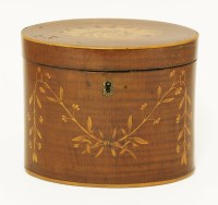 Lot 172 - A George III oval mahogany tea caddy