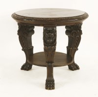 Lot 597 - An oak circular table