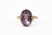Lot 1030 - A 9ct rose gold single stone oval cut amethyst ring