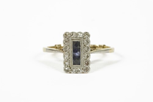 Lot 1040 - An 18ct gold Art Deco sapphire and diamond plaque ring