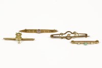 Lot 1008 - Four assorted bar brooches to include a 9ct gold devil with rose cut diamond eyes bar brooch