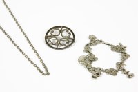 Lot 1108 - A collection of silver jewellery to include a silver cross with engraved decoration