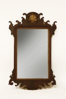 Lot 1639 - A George III mahogany and parcel gilt fret carved wall mirror