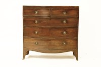 Lot 1616 - A Regency mahogany bowfronted chest of two short above three long drawers on swept feet