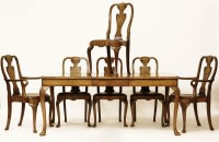 Lot 1732 - A Queen Anne design walnut dining table and six chairs
183 x 98 x 78 cm