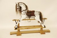 Lot 1774 - A child's dapple grey painted and decorated carved wood rocking horse