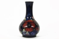 Lot 1249 - A William Moorcroft 'Pansy' vase