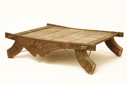 Lot 1748 - An Indonesian style metal bound coffee table