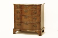 Lot 1724 - A Continental four drawer serpentine front chest