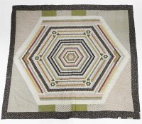 Lot 1673 - A patchwork quilt