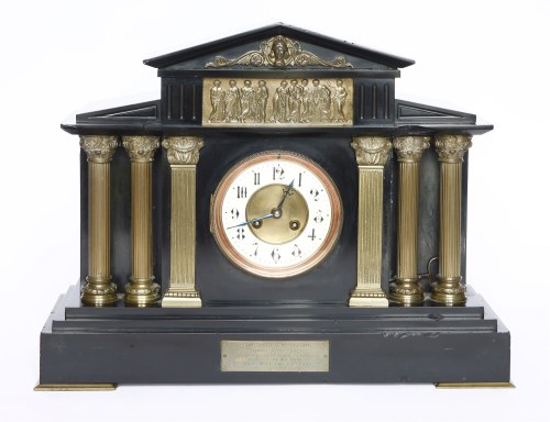 Lot 121 - An Edwardian black marble mantel clock