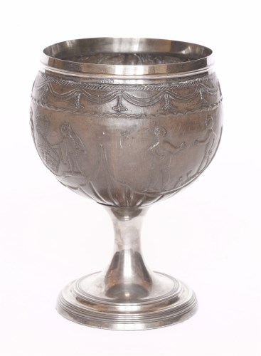 Lot 81 - A silver-mounted stemmed coconut cup