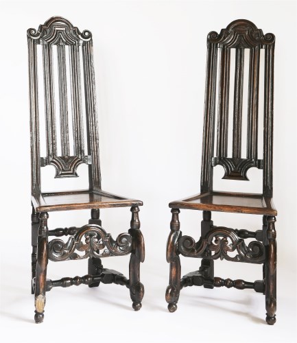 Lot 171 - A pair of Continental oak and walnut high back single chairs