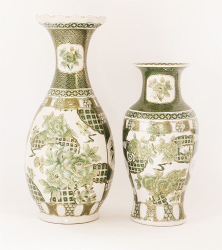 Lot 183 - Two Japanese famille verte and gilt decorated vases