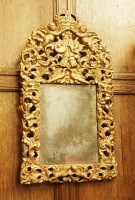 Lot 203 - A pierced giltwood wall mirror