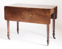 Lot 208 - A solid mahogany Pembroke table