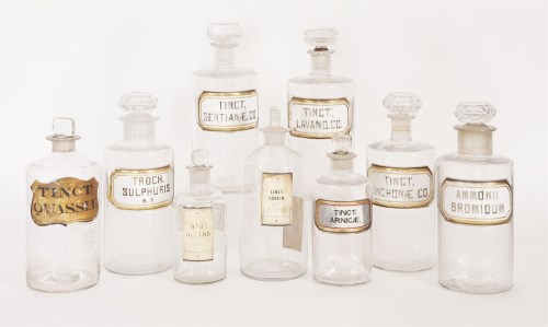 Lot 196 - A collection of nine glass apothecary's jars and stoppers