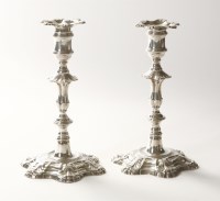 Lot 211 - A pair of George II silver table candlesticks