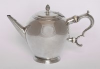 Lot 212 - A George II Scottish bullet-shaped silver teapot
