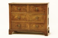 Lot 1676 - An early 19th century Continental walnut and oak four drawer chest
