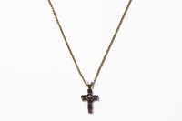 Lot 1071 - A 9ct gold oval cut diamond and amethyst set cross on 9ct gold chain 
3.65g